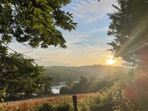 Image for web_pic_1200_wide_sunrise_at_sharpham_july_22_by_retreatant_madeline_2-image(1200×900-crop-autorotate)